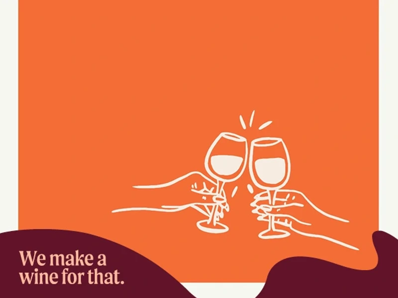 a pair of hands clinking wine glasses